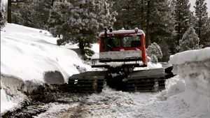 To get back into the snowcat, he was hur